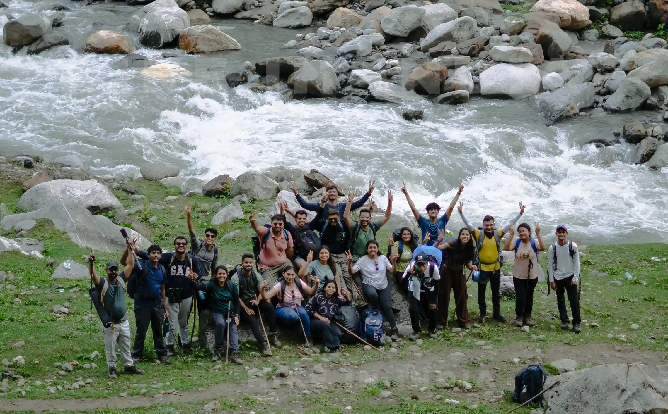 Group with River at Hampta Pass Trek
