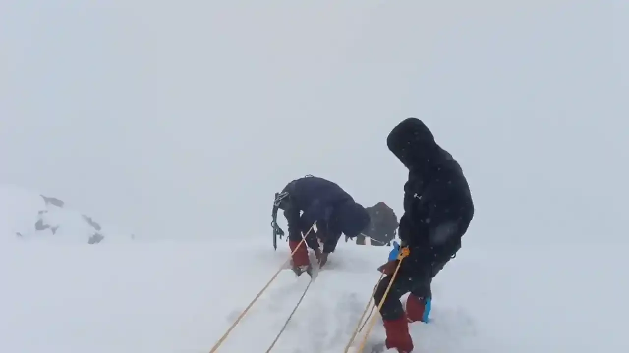 Ascending with the help of Rope on Traills Pass Expedition